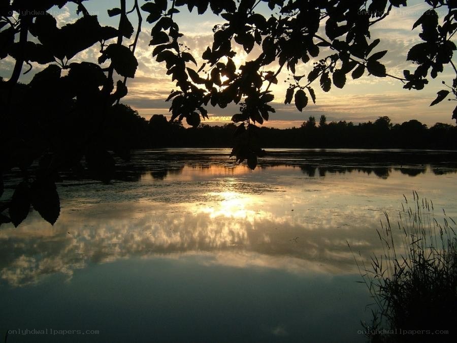 Sunset over a calm lake