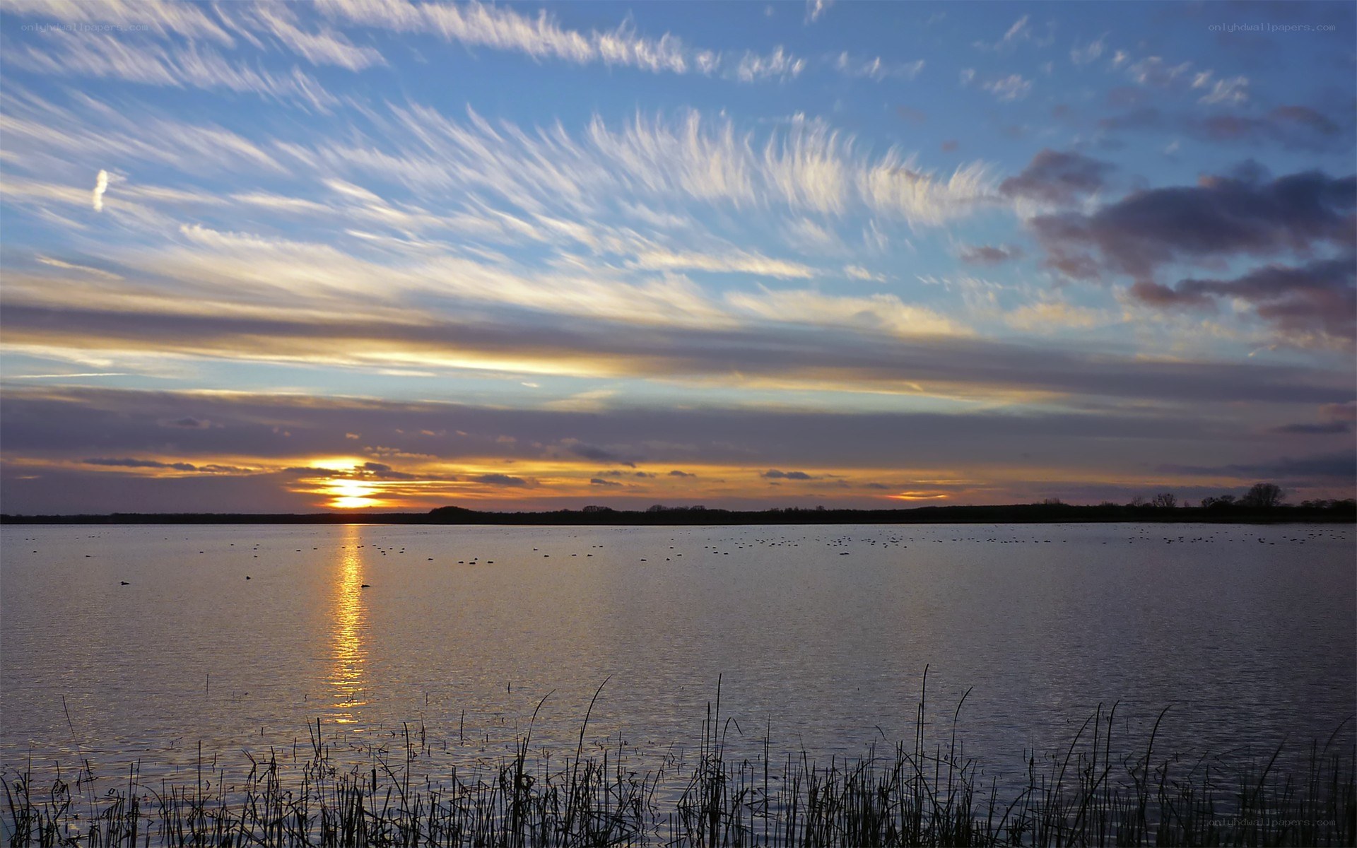 Sunset over a calm lake