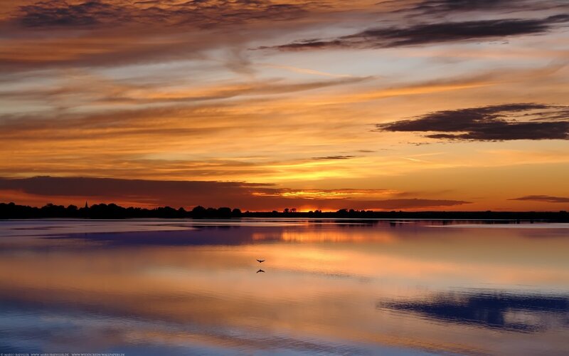 Sunset over a calm lake
