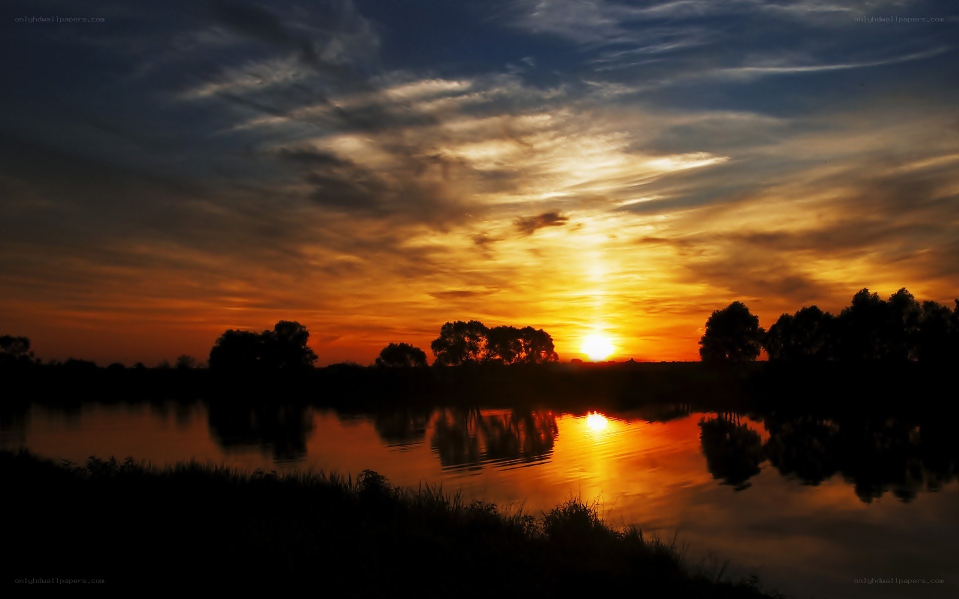 Sunset over a calm lake