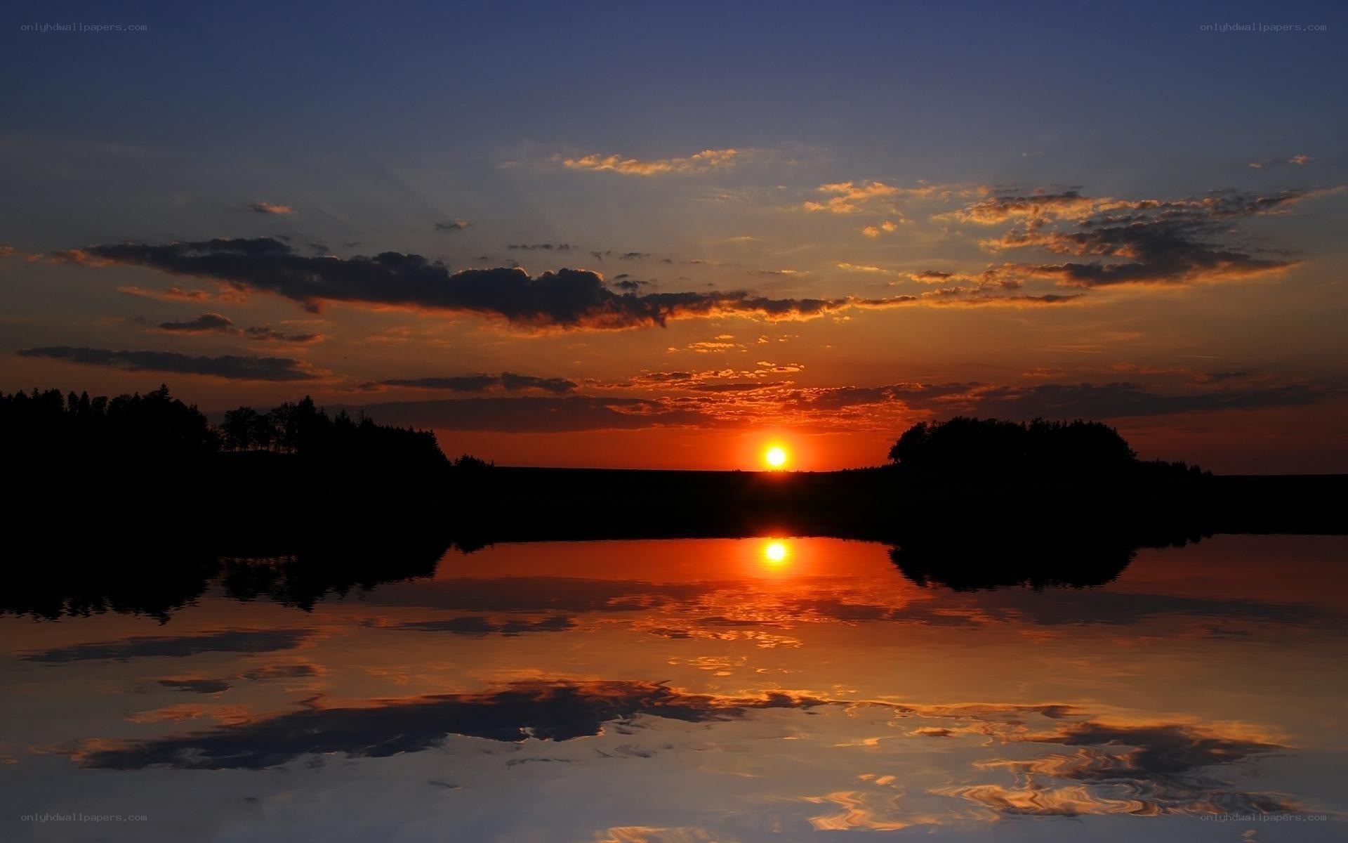 Sunset over a calm lake