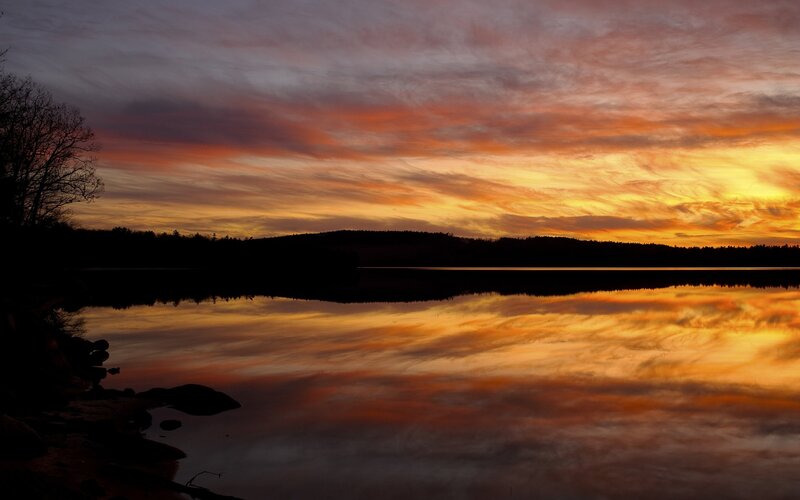 Sunset over a calm lake