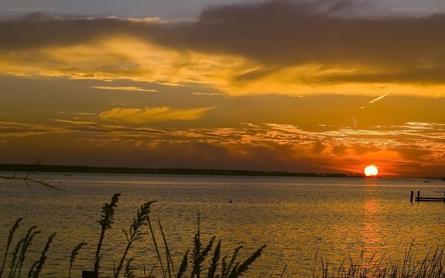 sunset over a calm lake