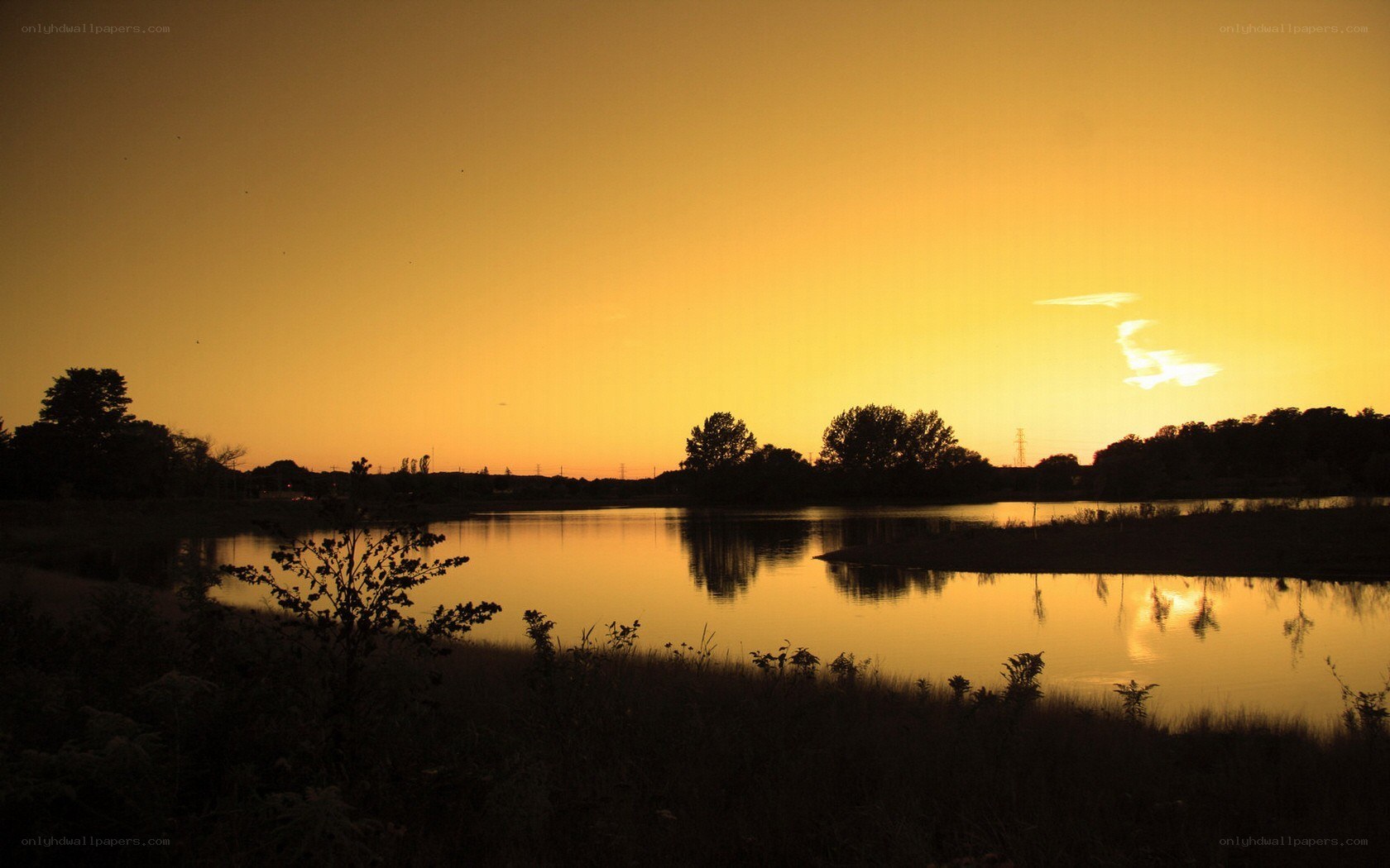 sunset over a calm lake
