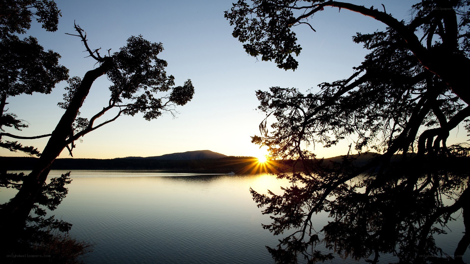 sunset over a calm lake
