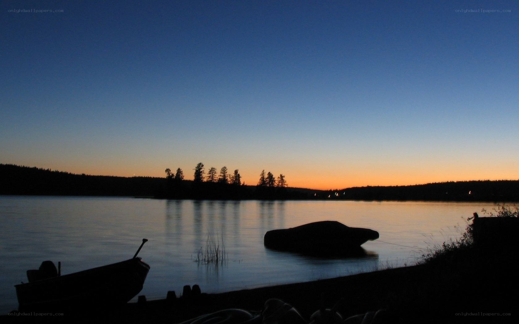 sunset over a calm lake