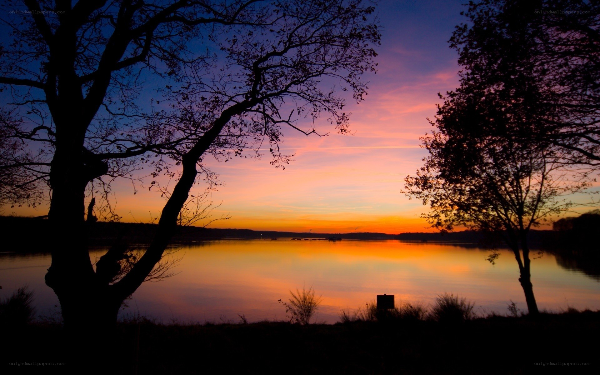 sunset over a calm lake