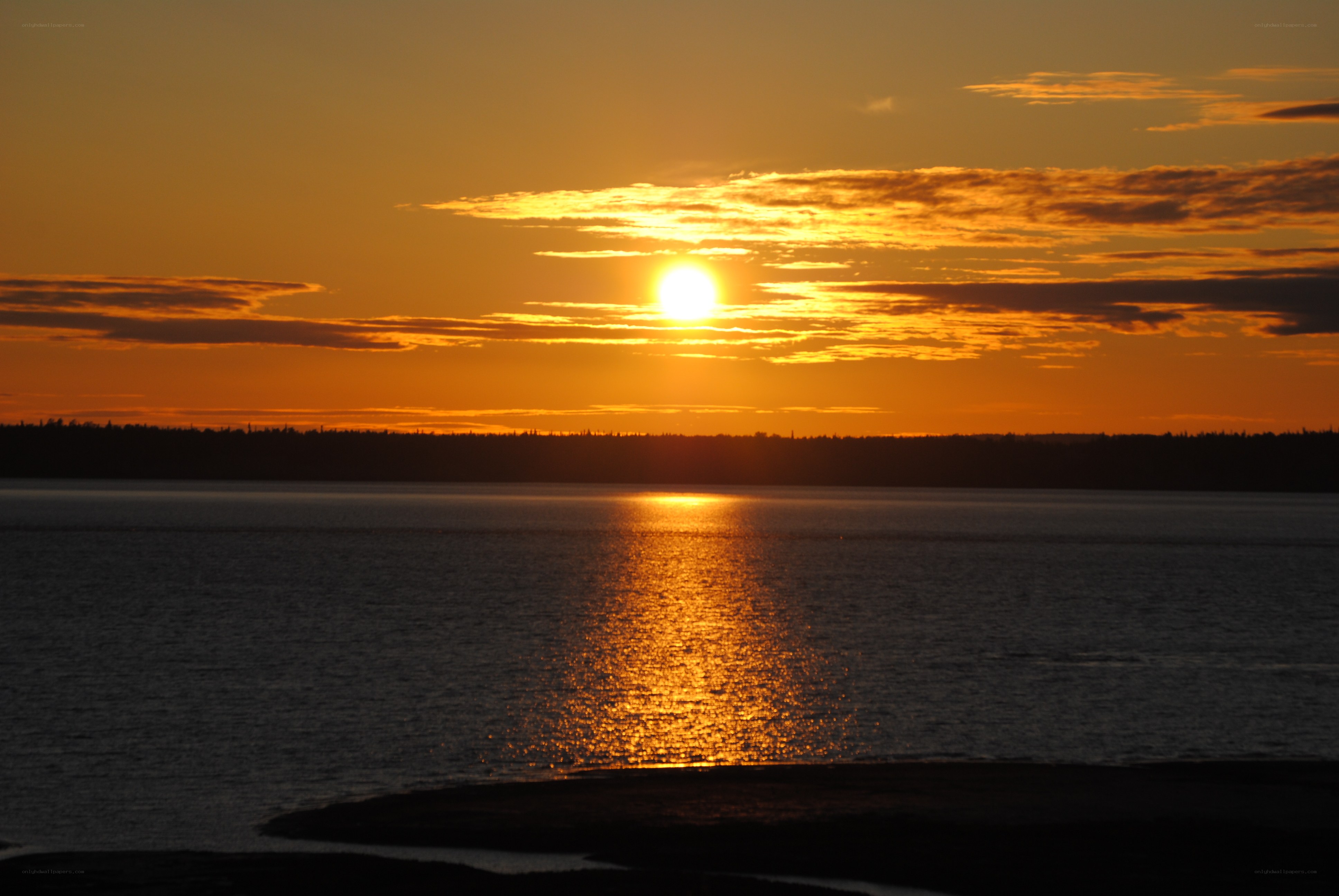 Sunset over a calm lake