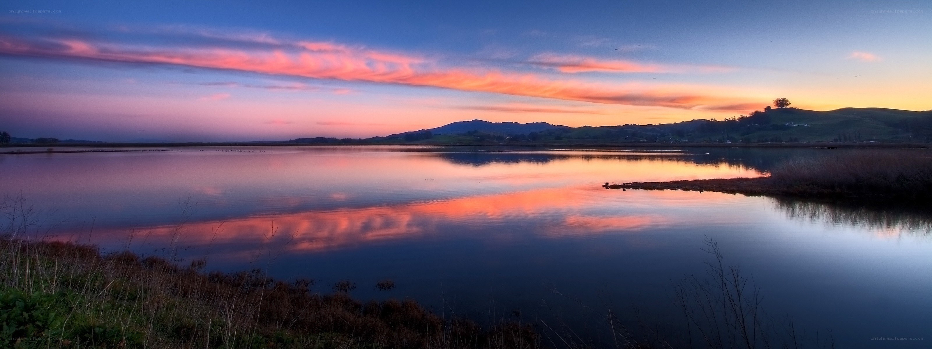 Sunset over a calm lake