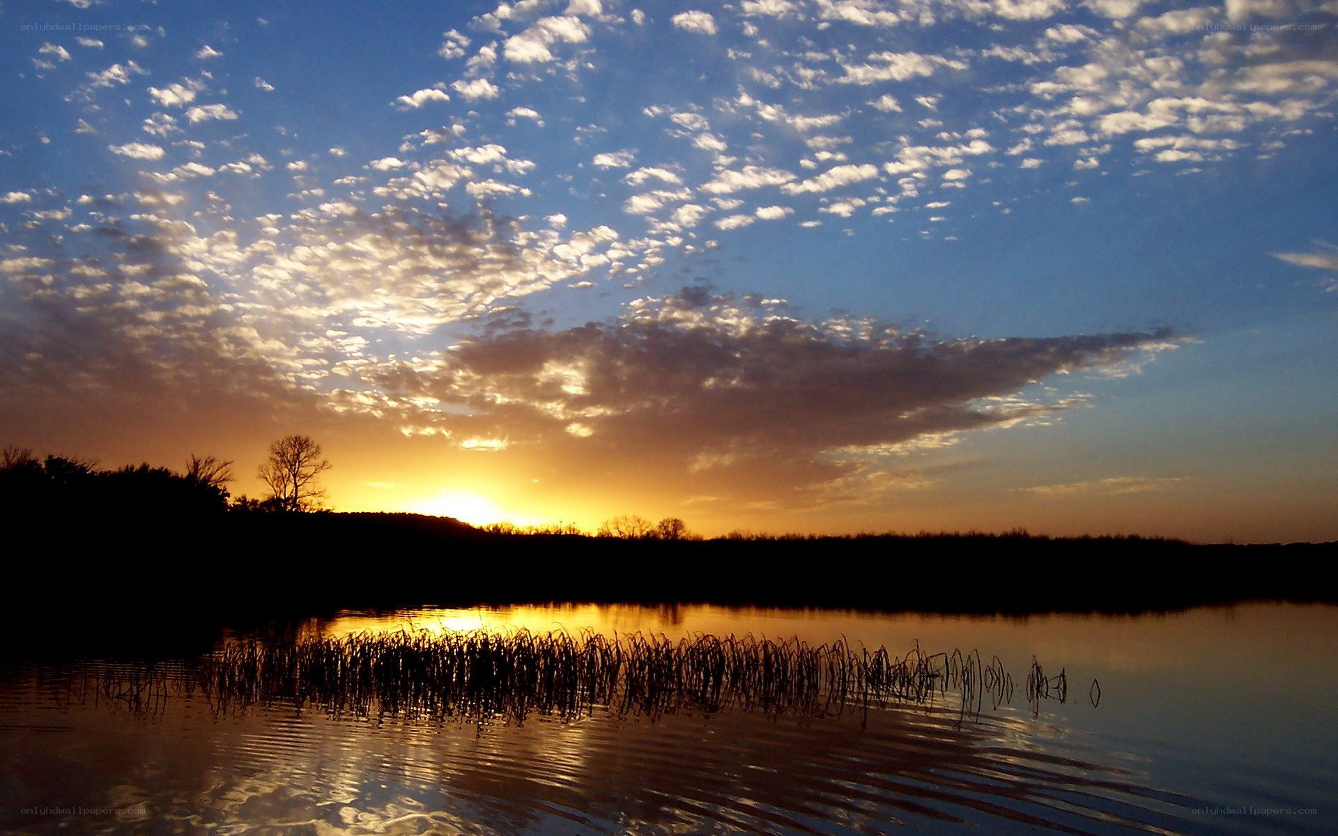 sunset over a calm lake