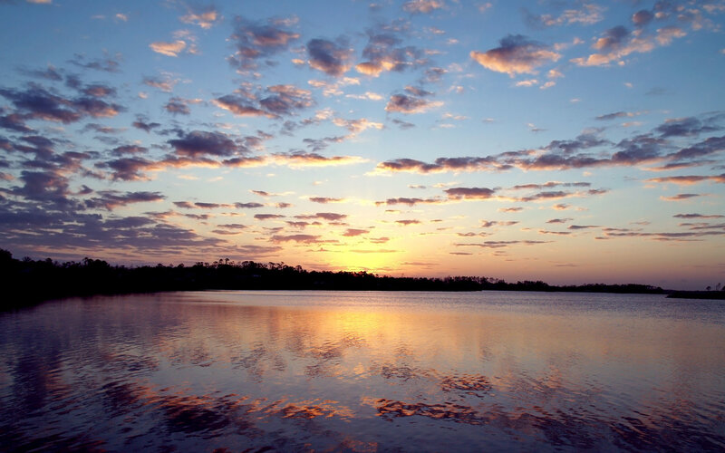 sunset over a calm lake