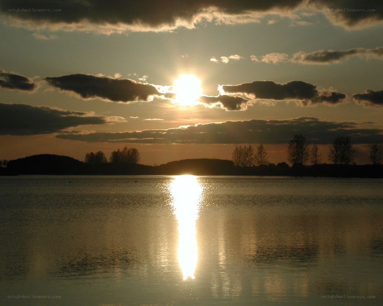 Sunset over a calm lake