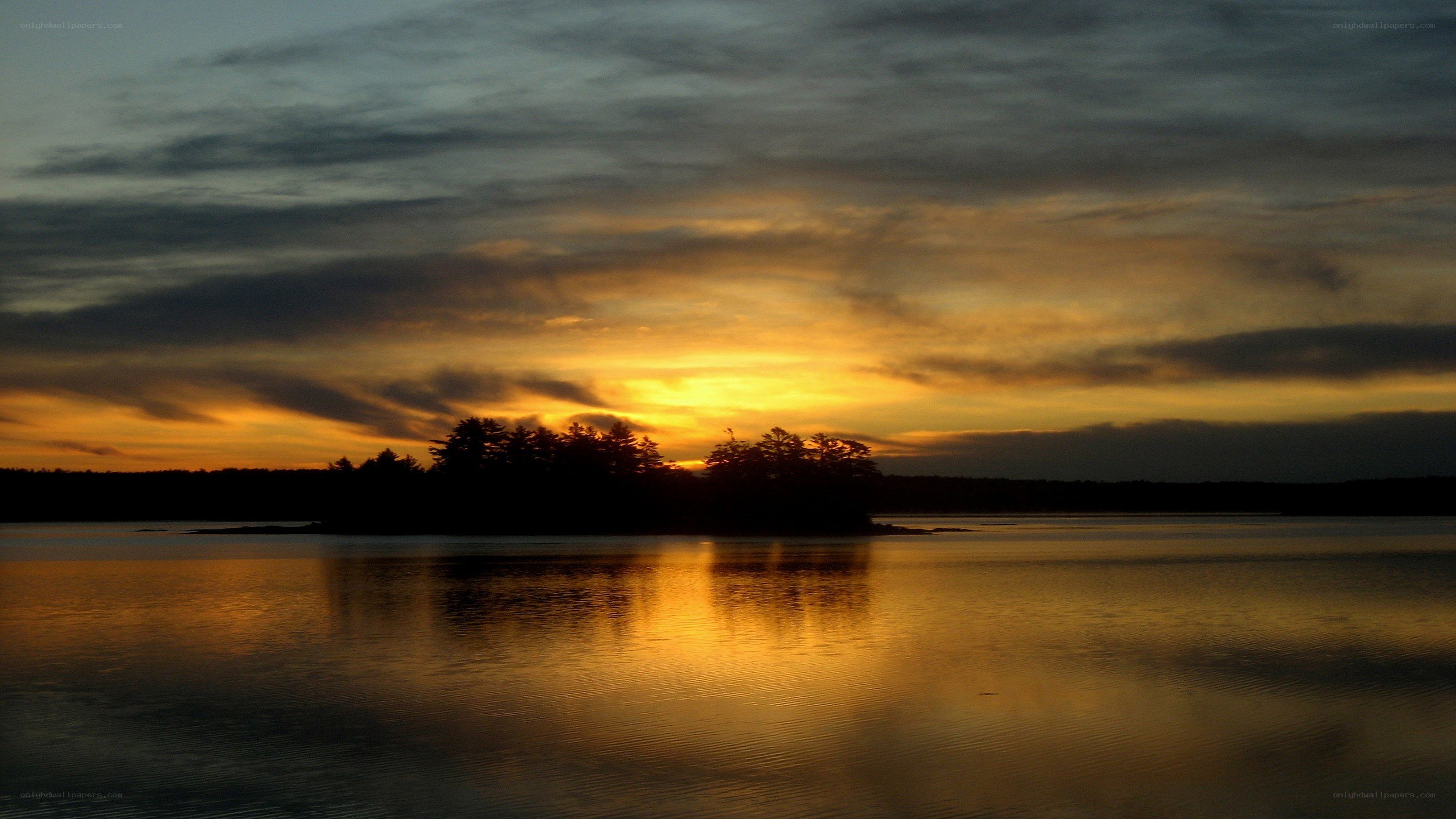 sunset over a calm lake