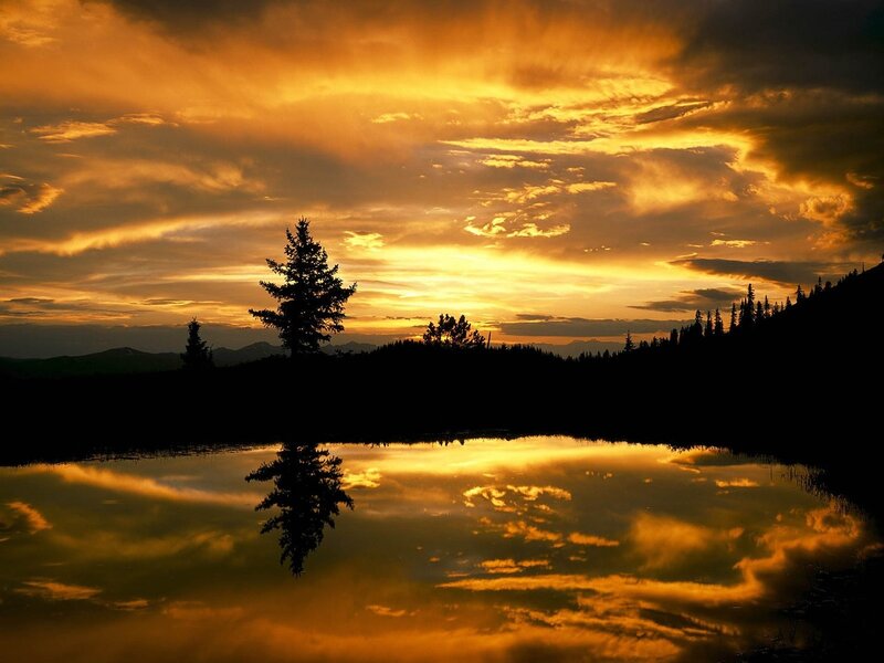 Sunset over a calm lake