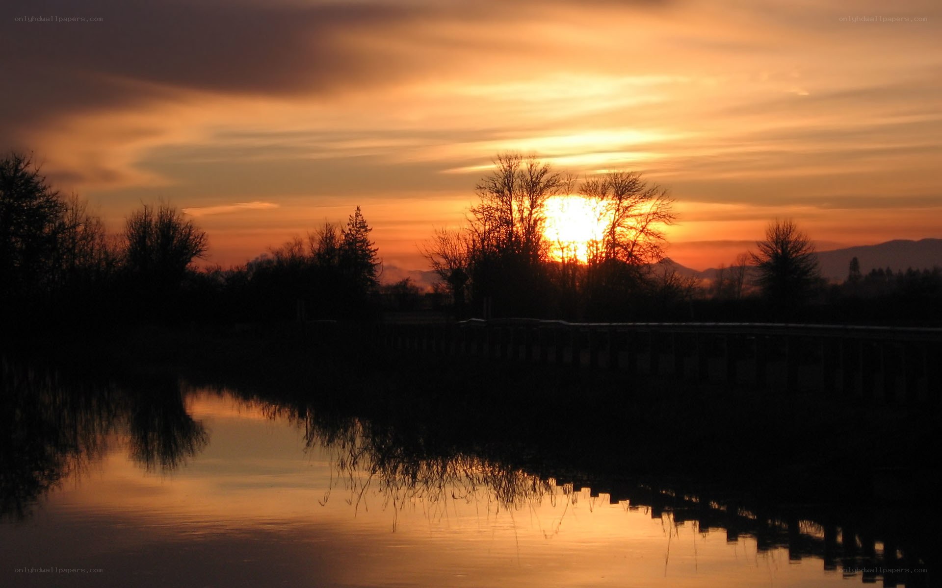 sunset over a calm lake