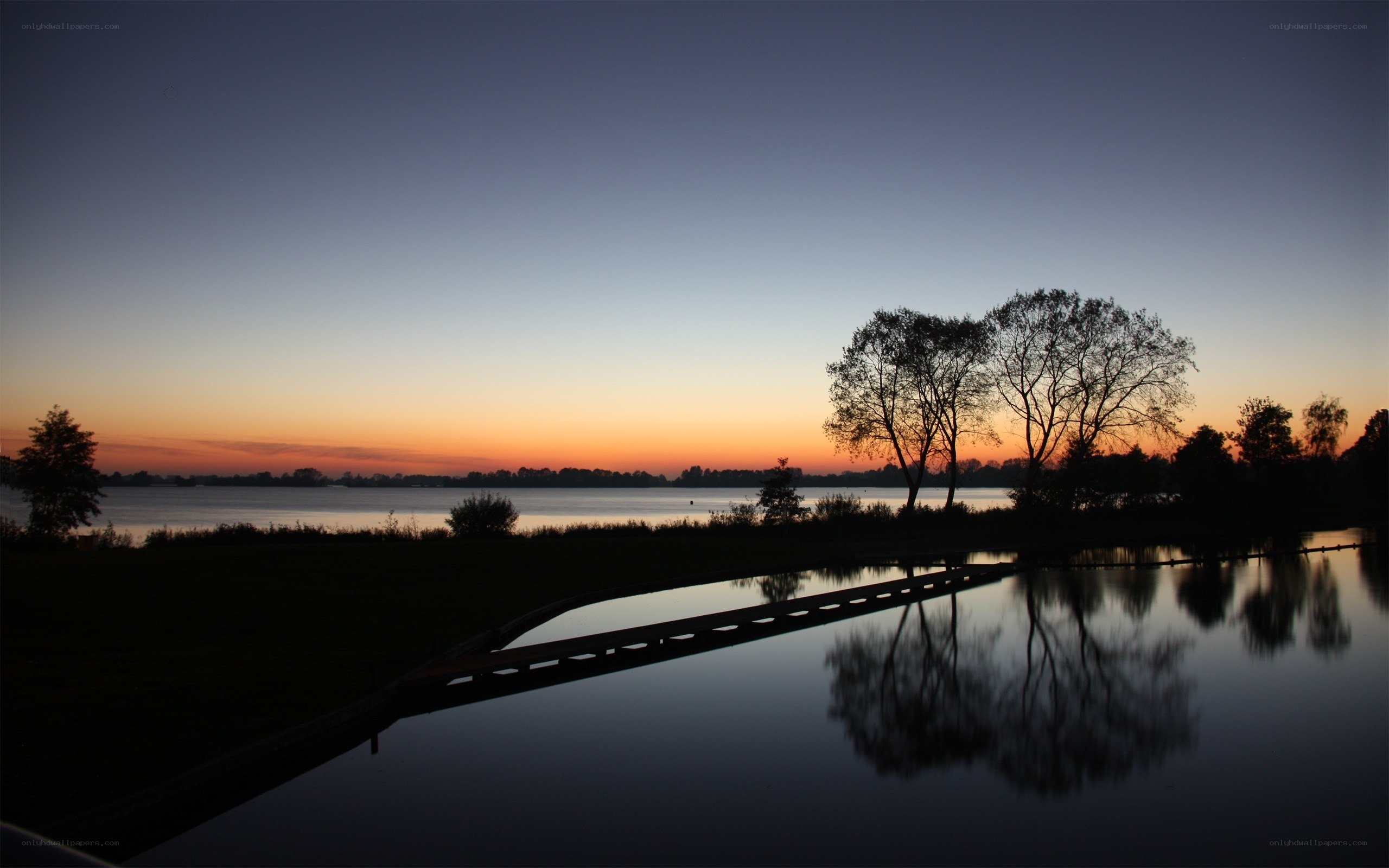 Sunset over a calm lake