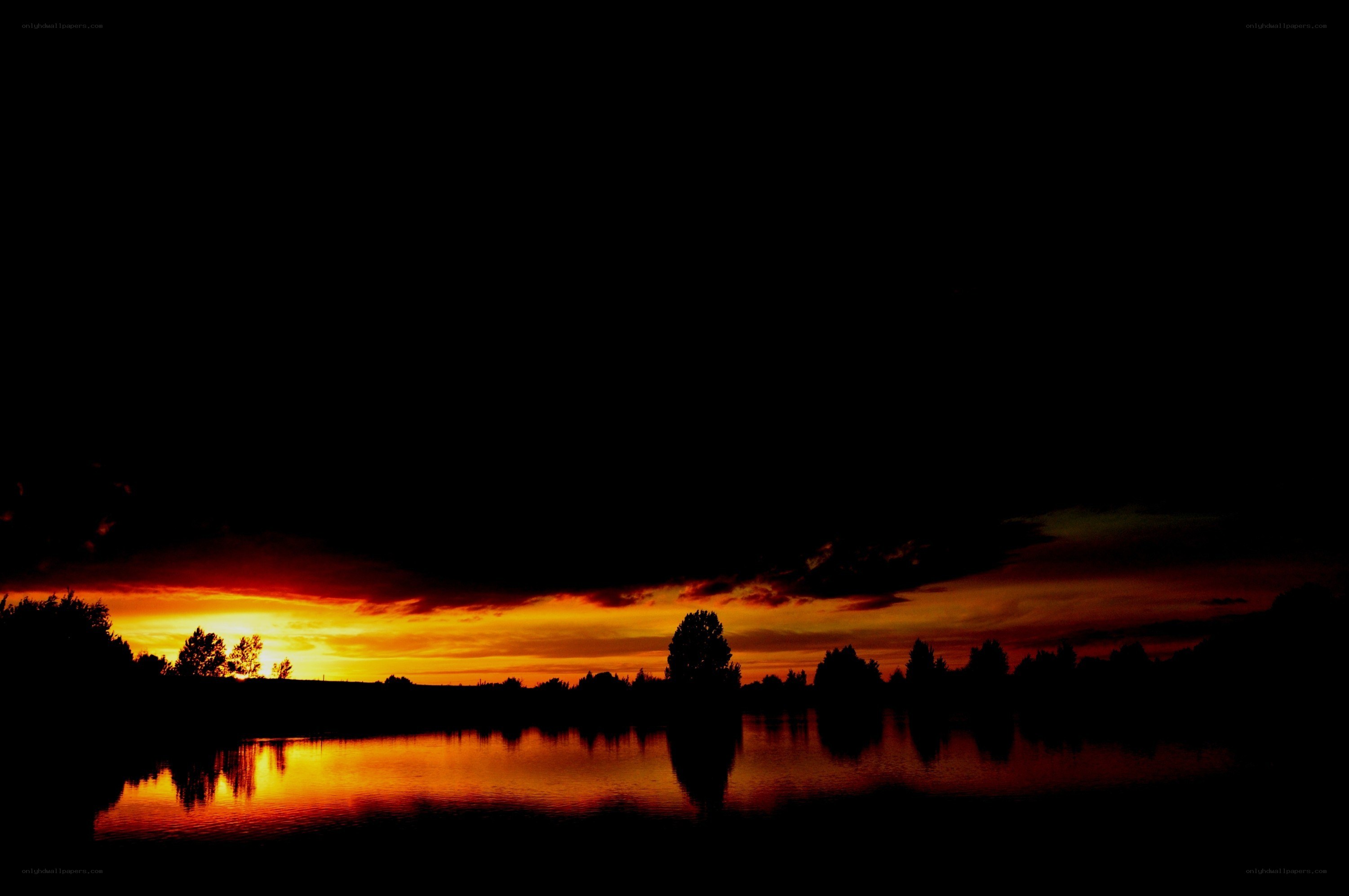 sunset over a calm lake