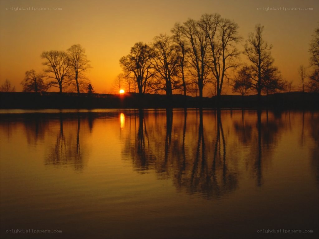 Sunset over a calm lake