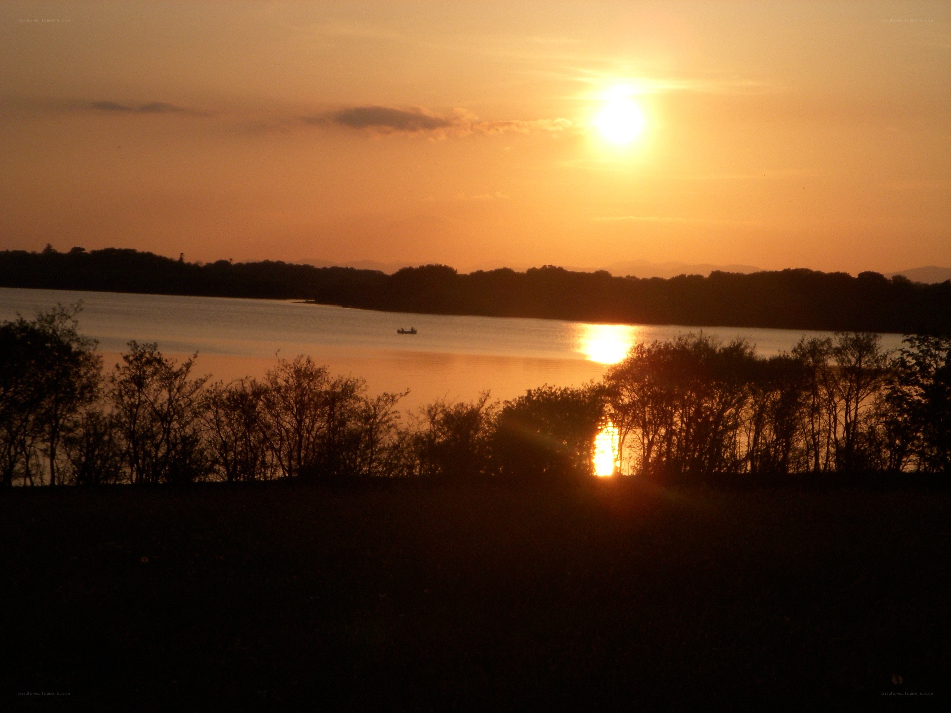 Sunset over a calm lake