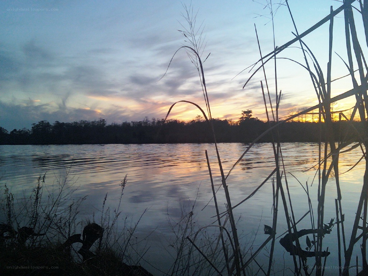 Sunset over a calm lake