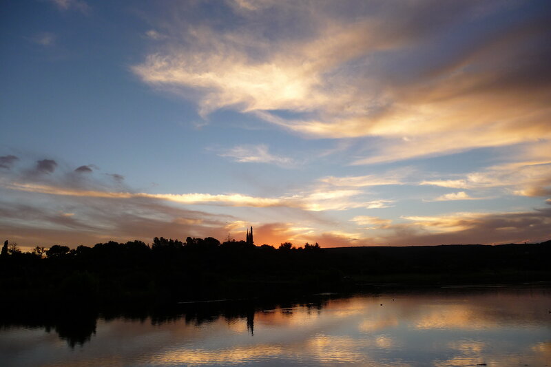 sunset over a calm lake