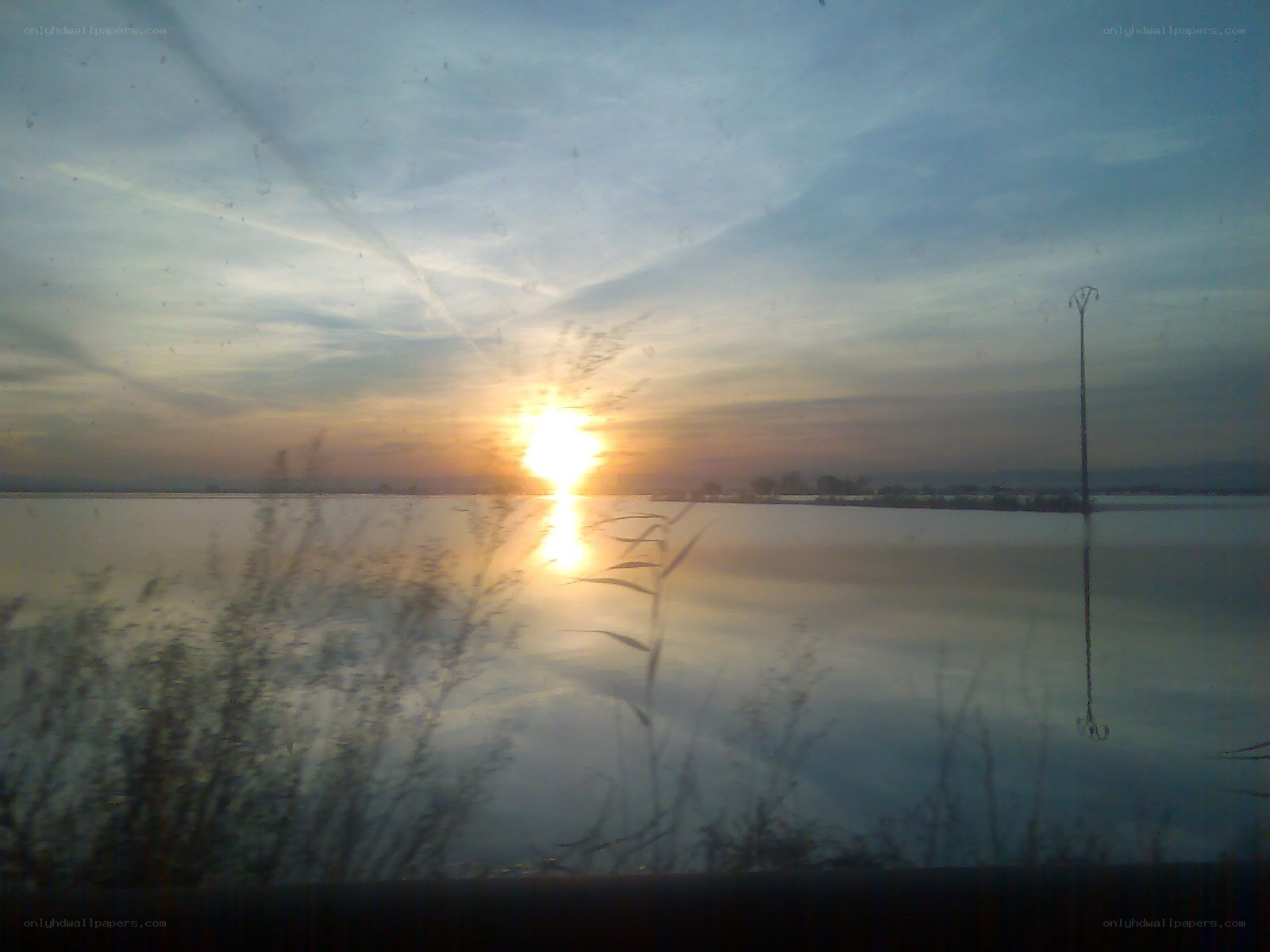 Sunset over a calm lake
