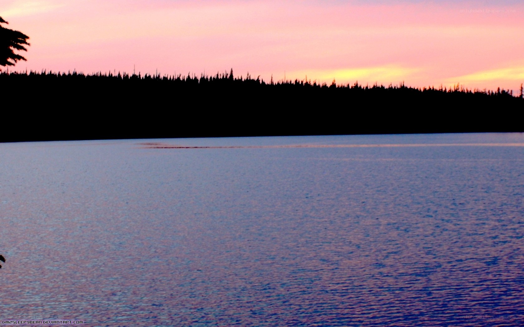 sunset over a calm lake