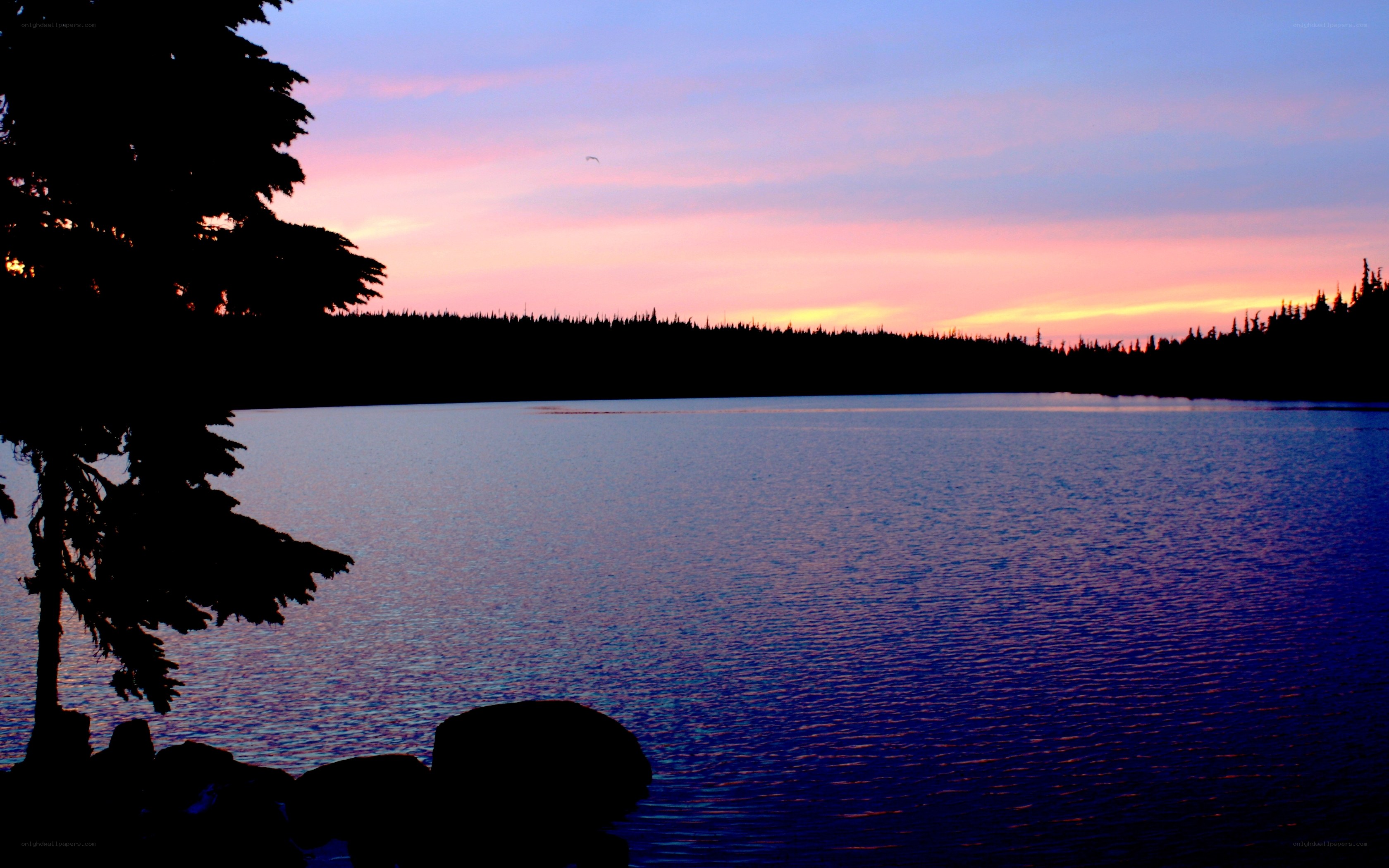 sunset over a calm lake
