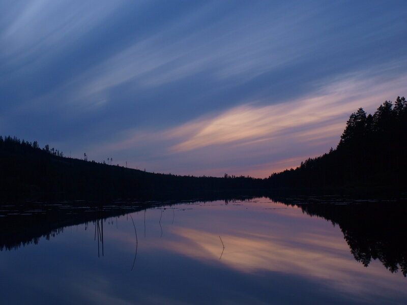 Sunset over a calm lake