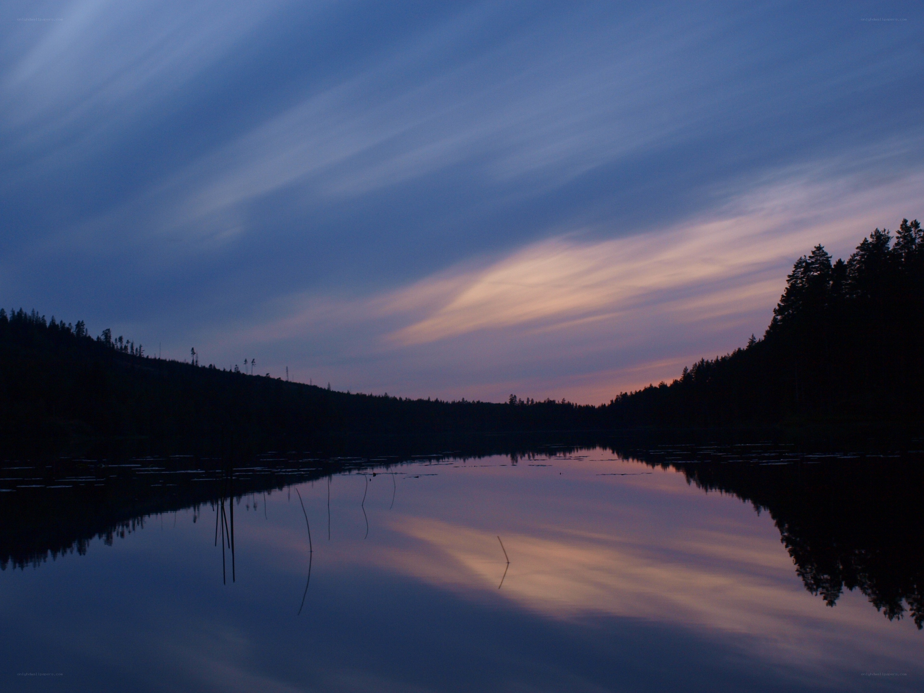Sunset over a calm lake