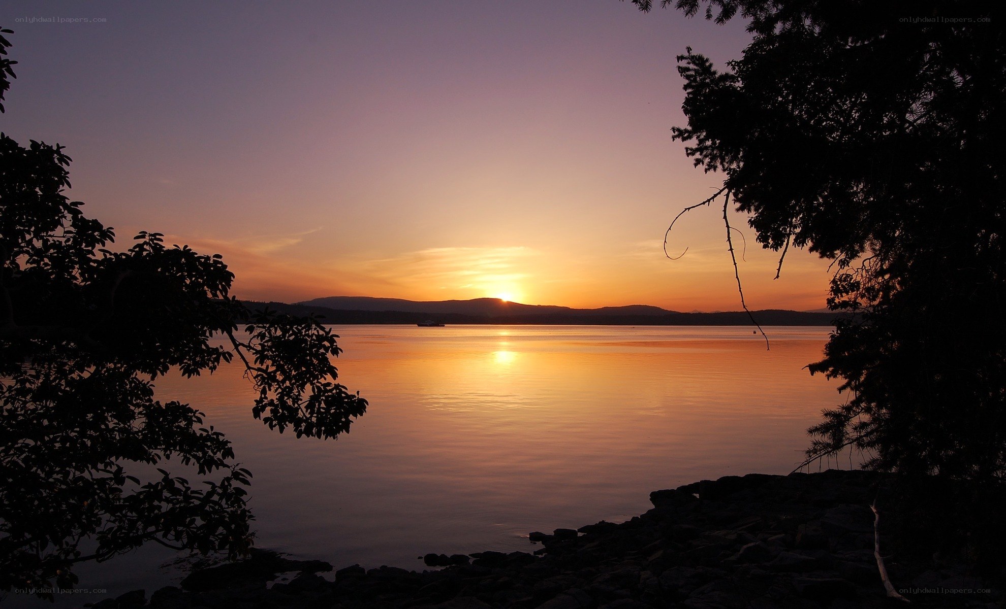 sunset over a calm lake