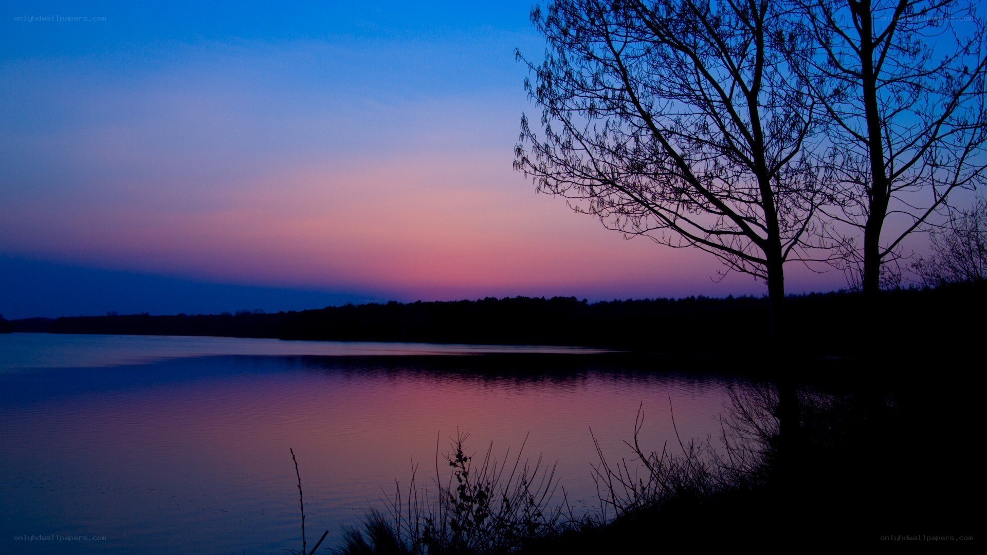 sunset over a calm lake