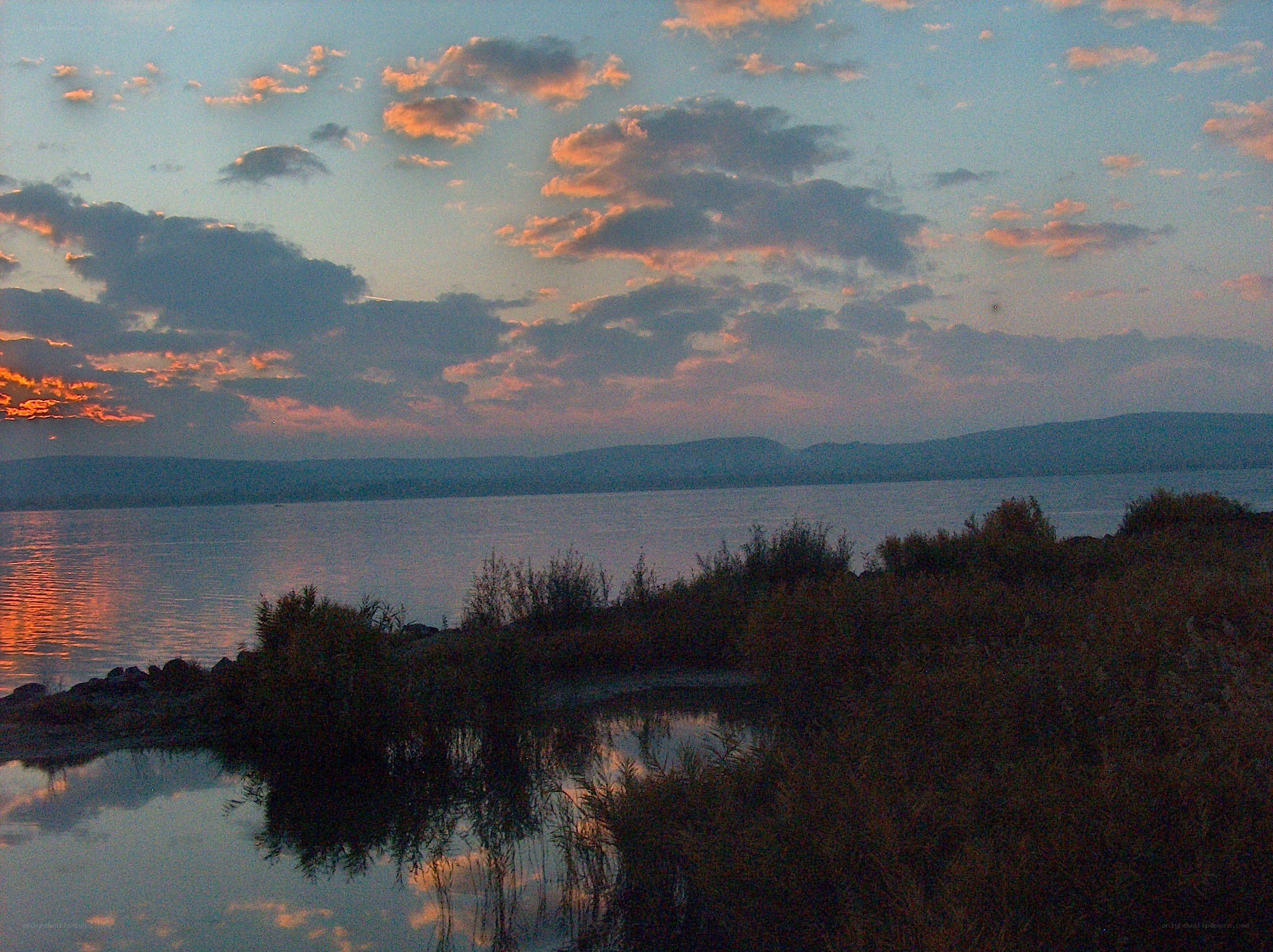 sunset over a calm lake