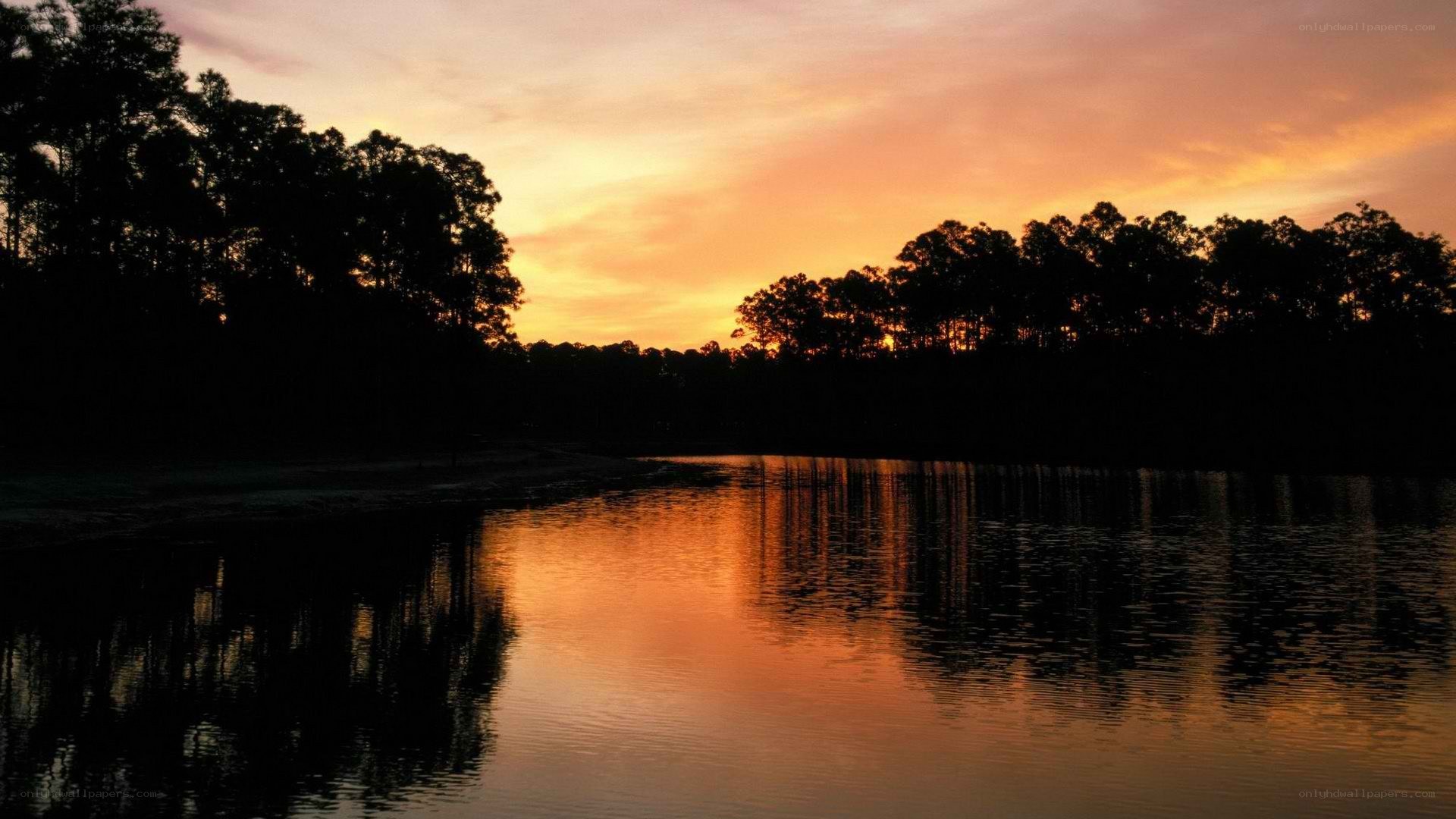 sunset over a calm lake