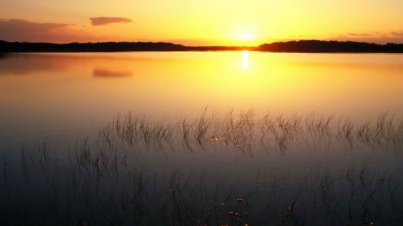 Sunset over a calm lake