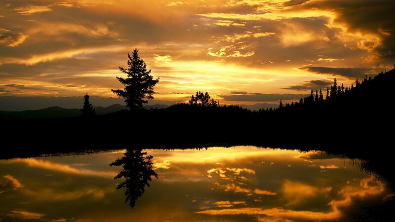 sunset over a calm lake