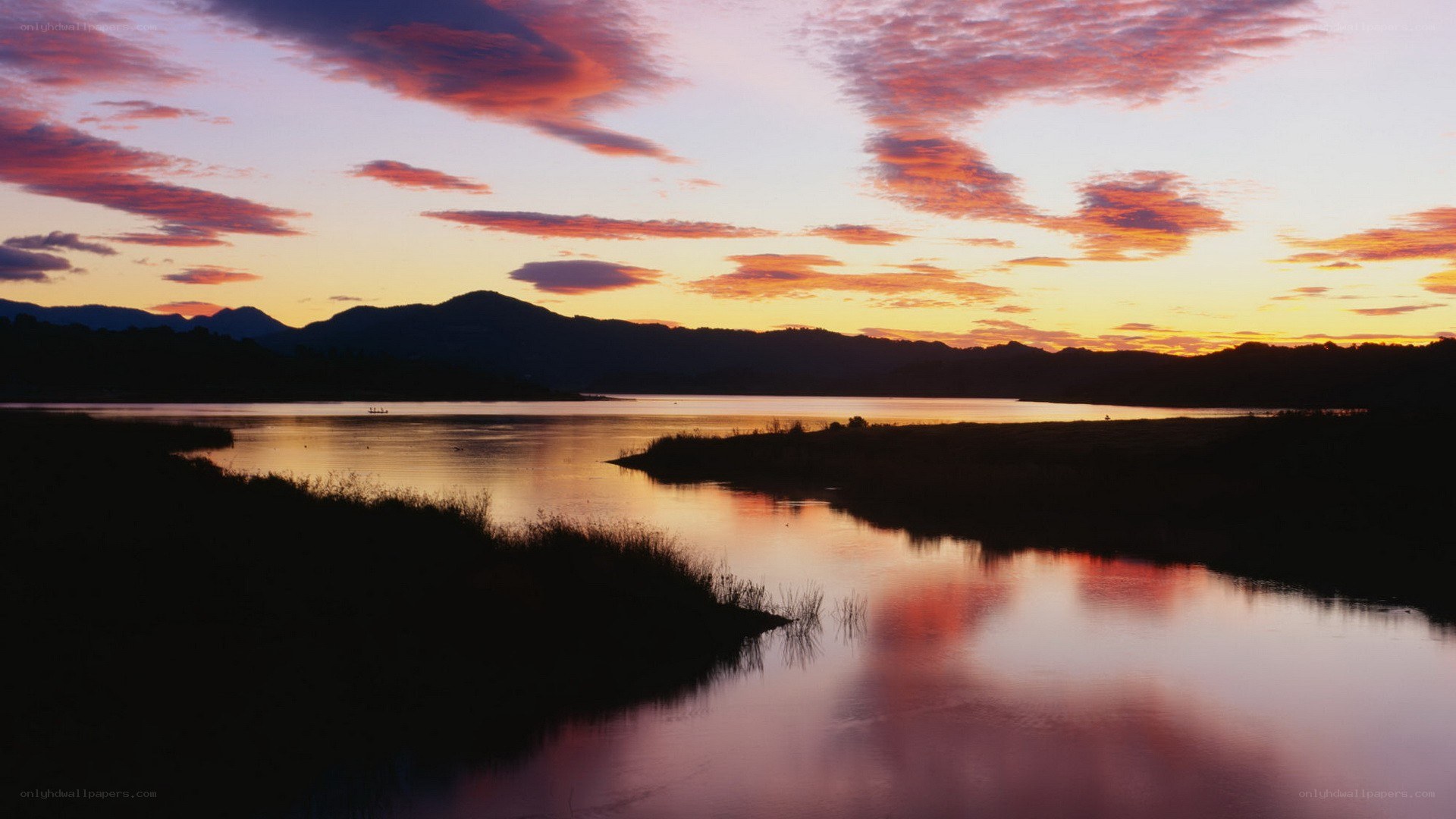 sunset over a calm lake