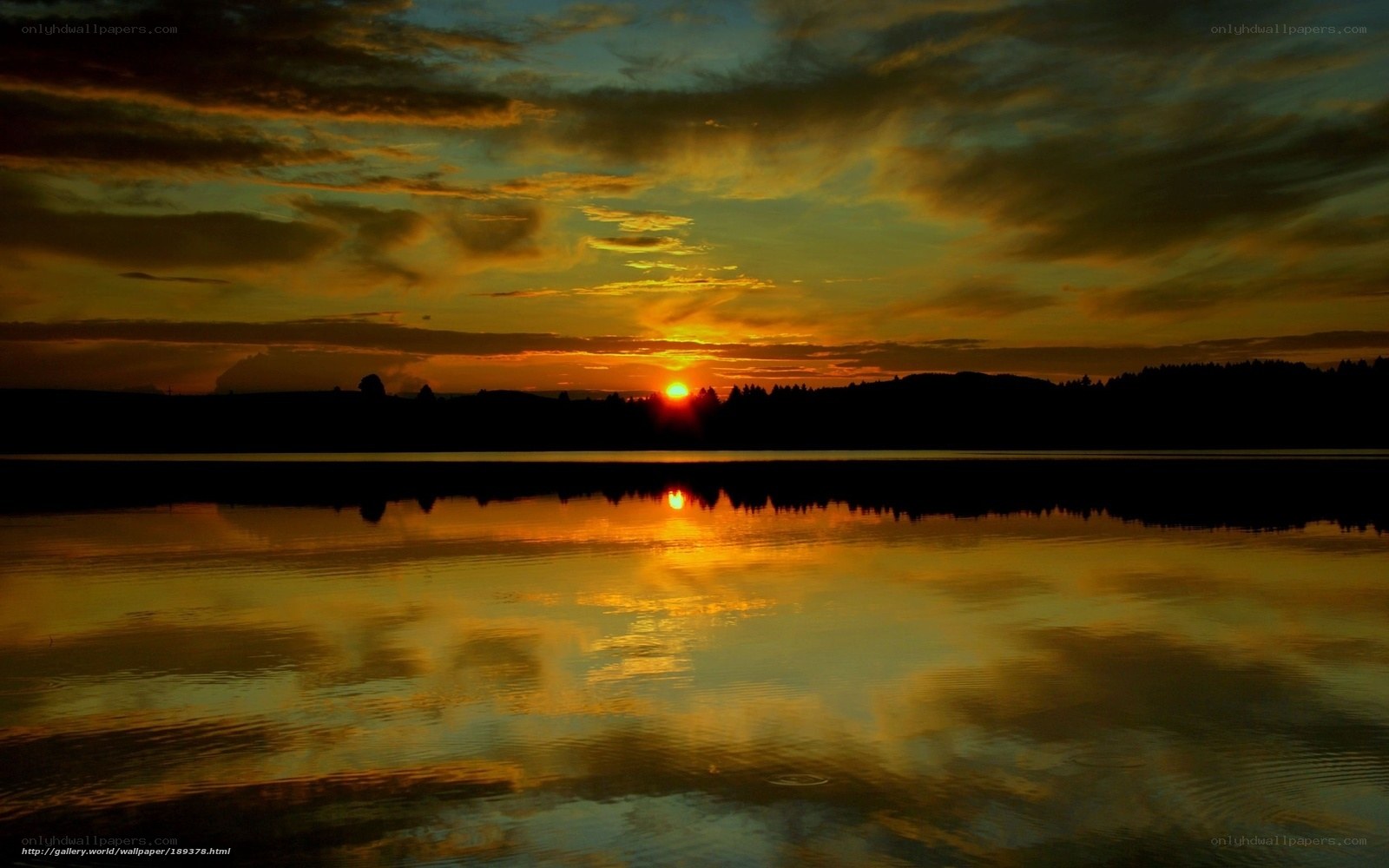 Sunset over a calm lake