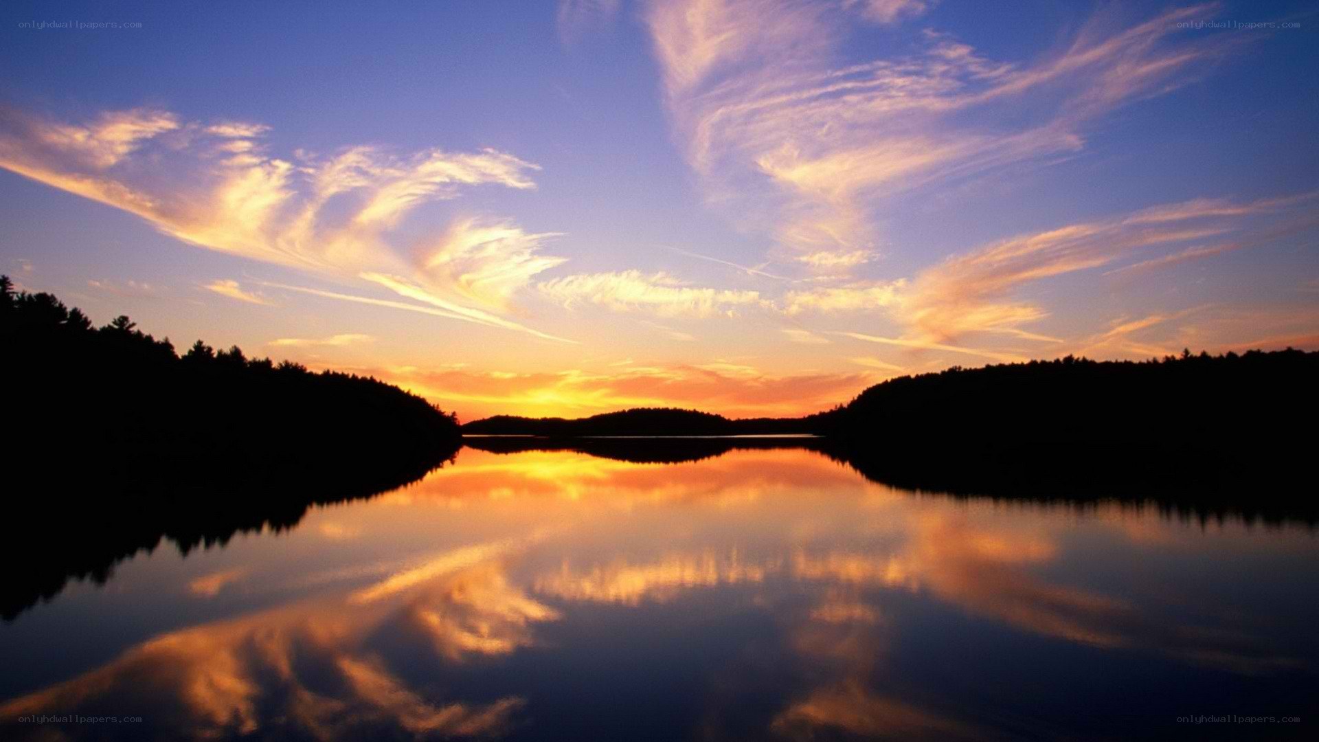 sunset over a calm lake