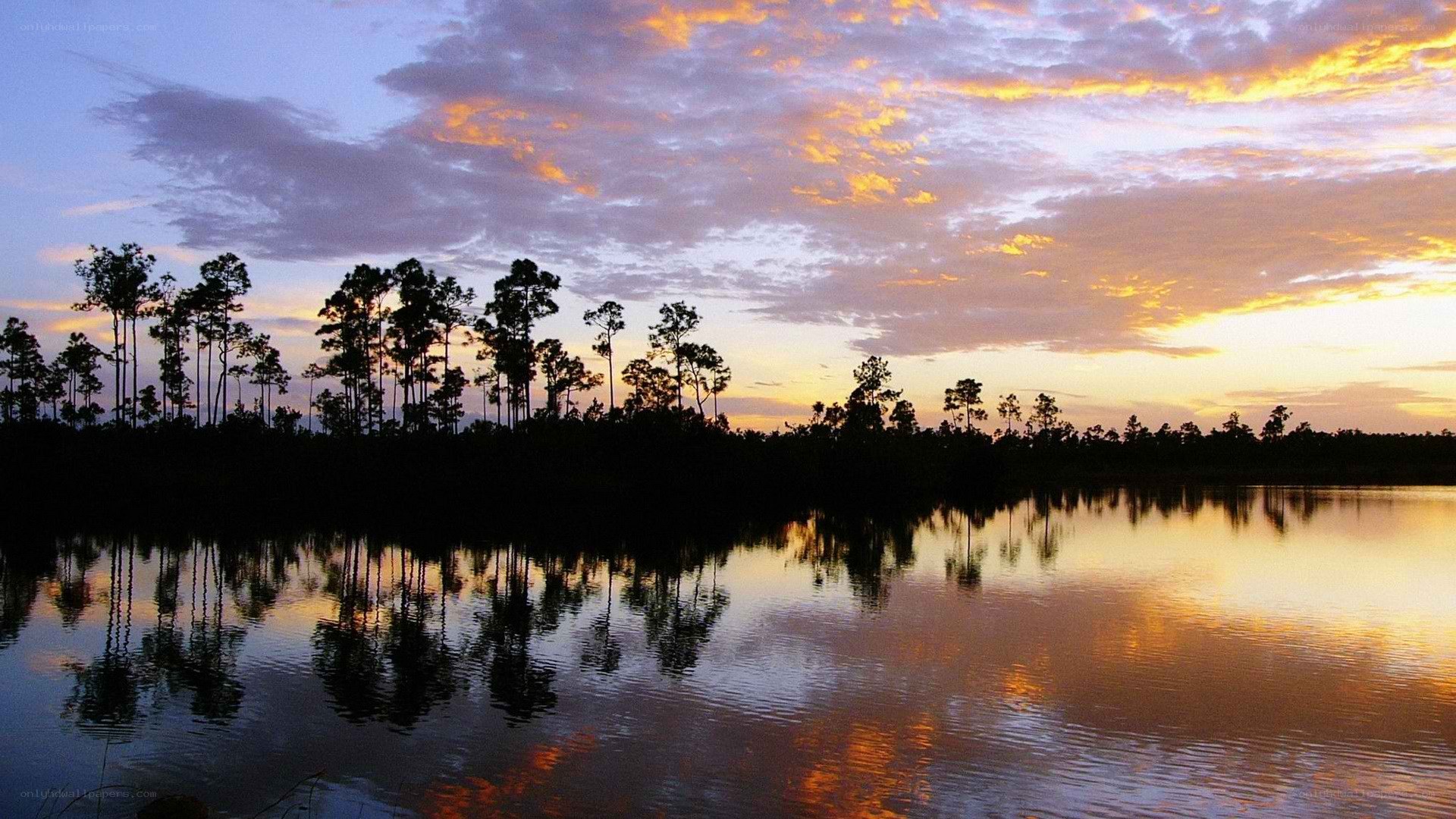 sunset over a calm lake