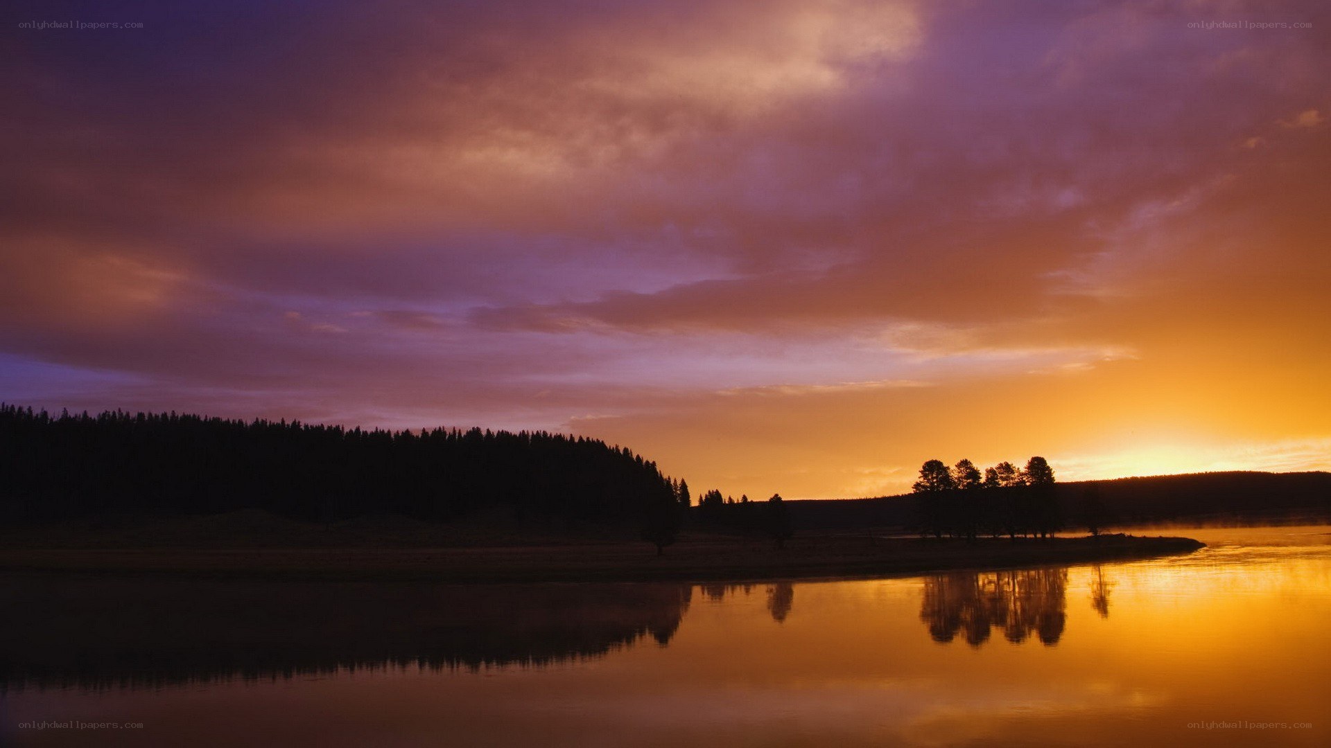 sunset over a calm lake