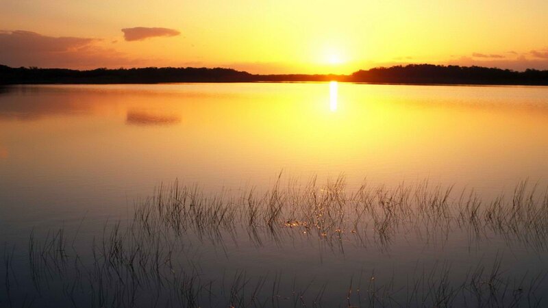Sunset over a calm lake