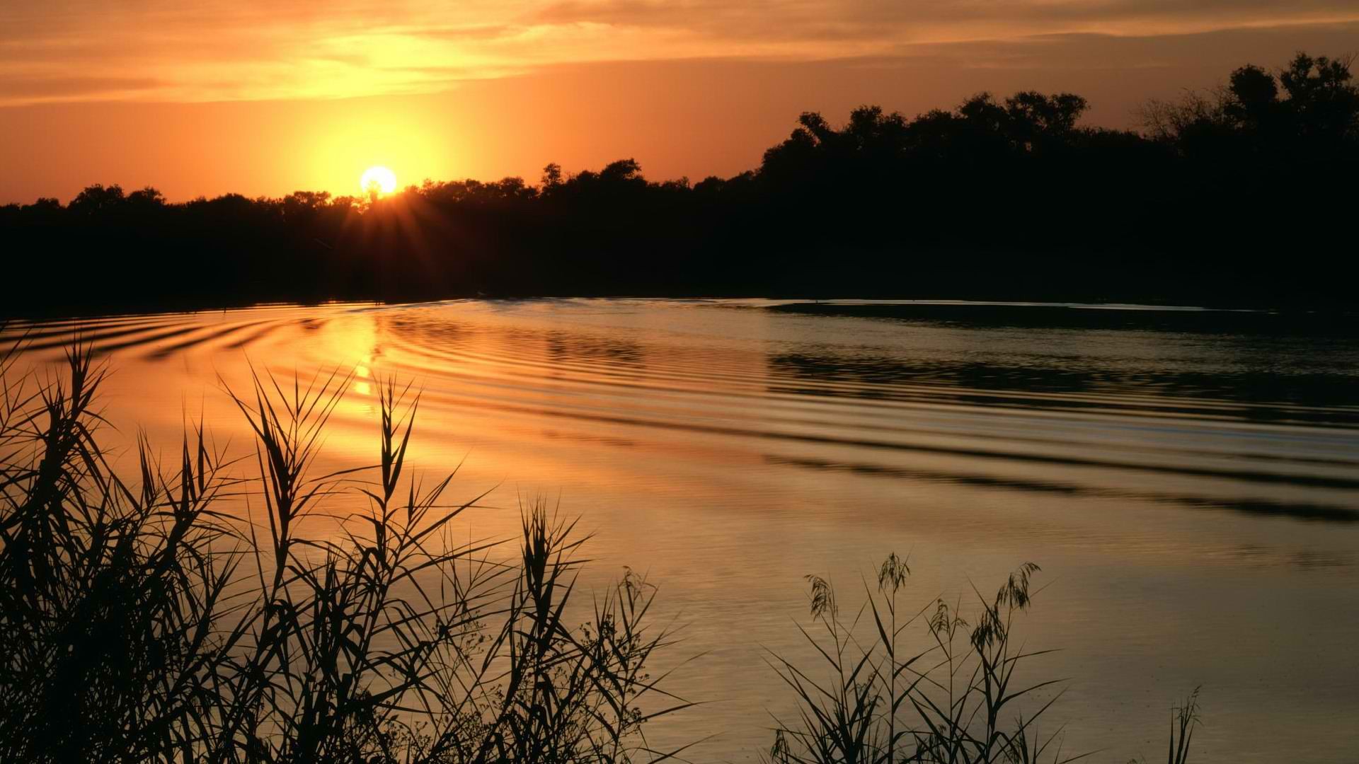Sunset over a calm lake