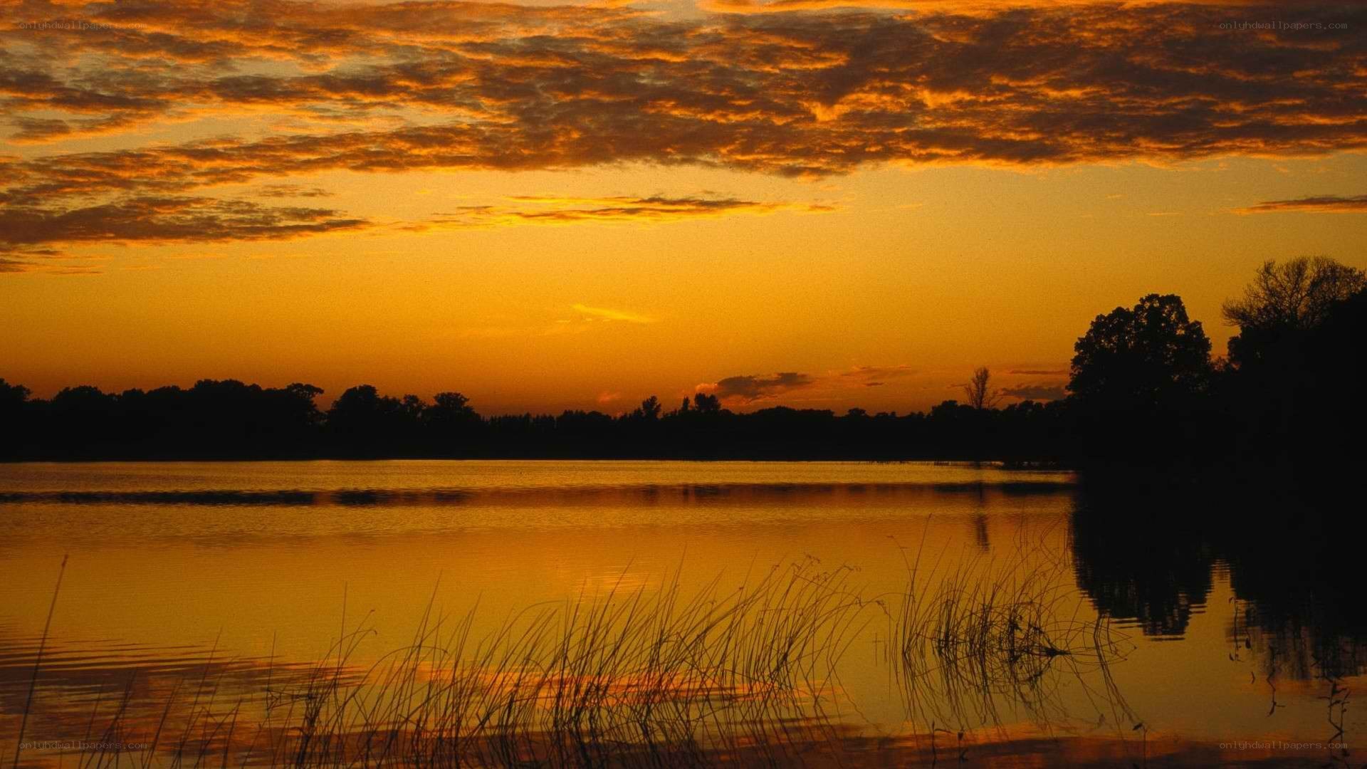 sunset over a calm lake