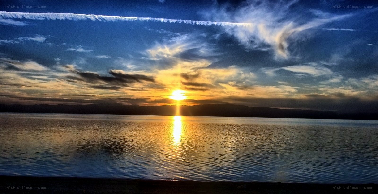 Sunset over a calm lake