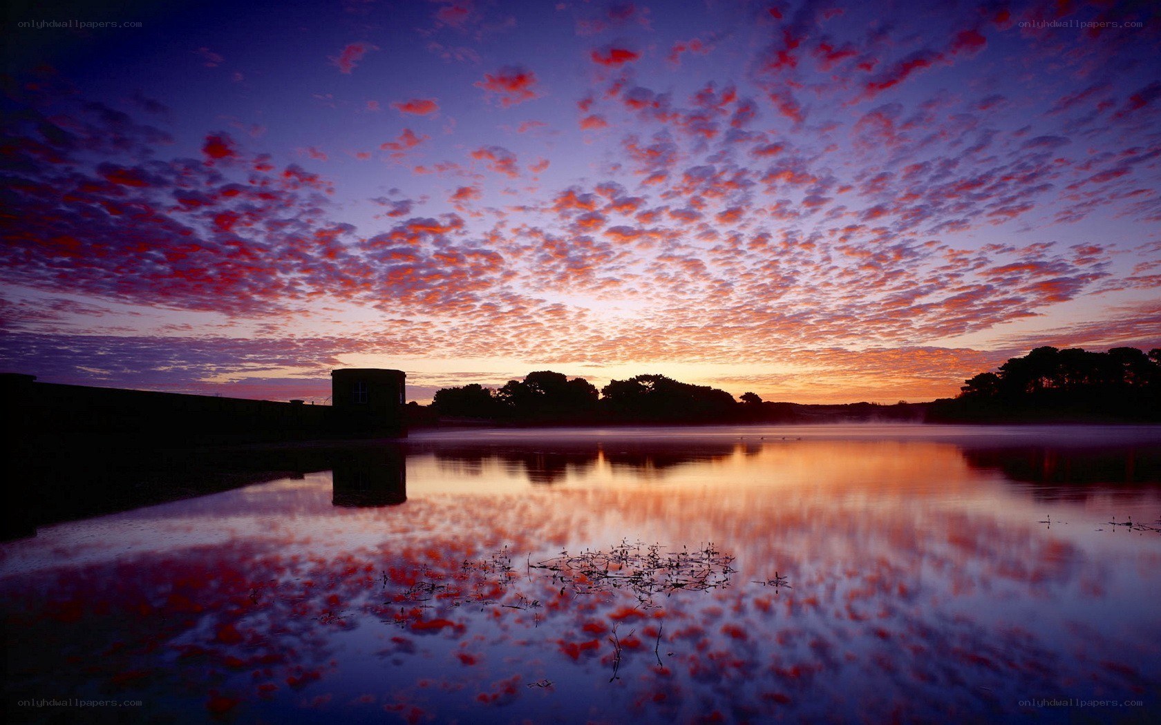 Sunset over a calm lake