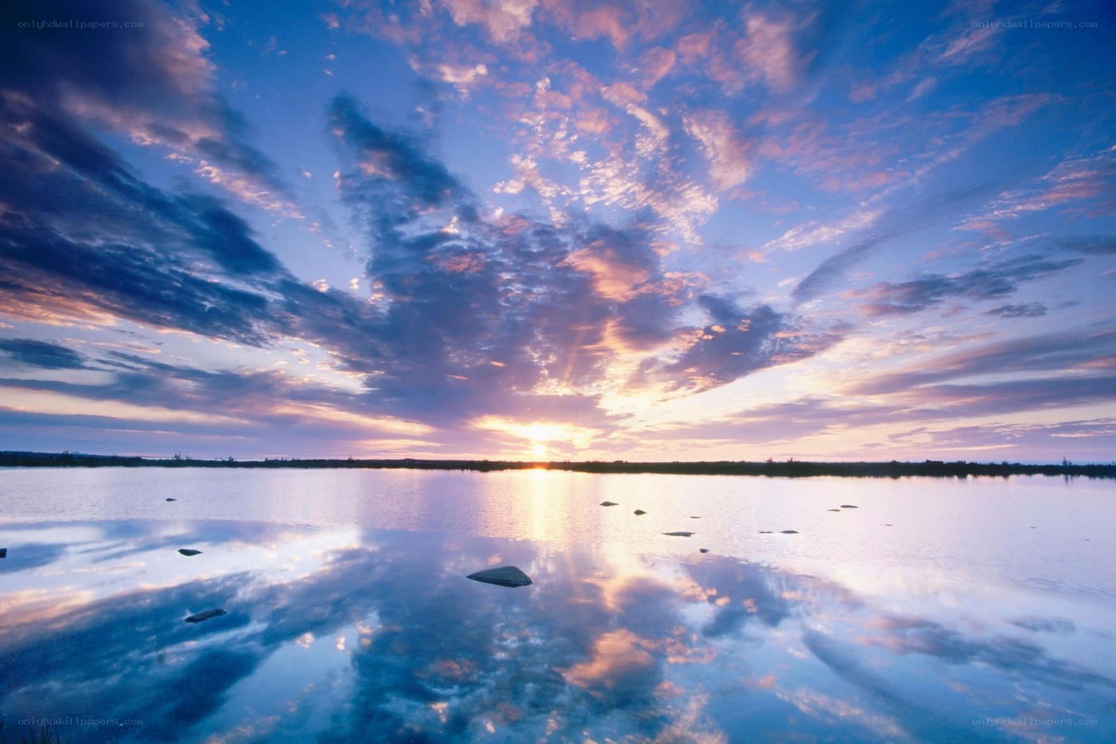 Sunset over a calm lake
