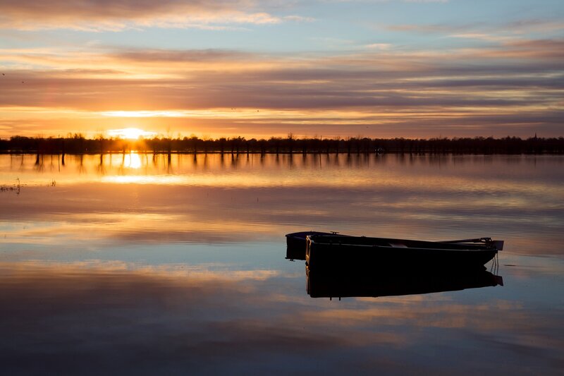 Sunset over a calm lake