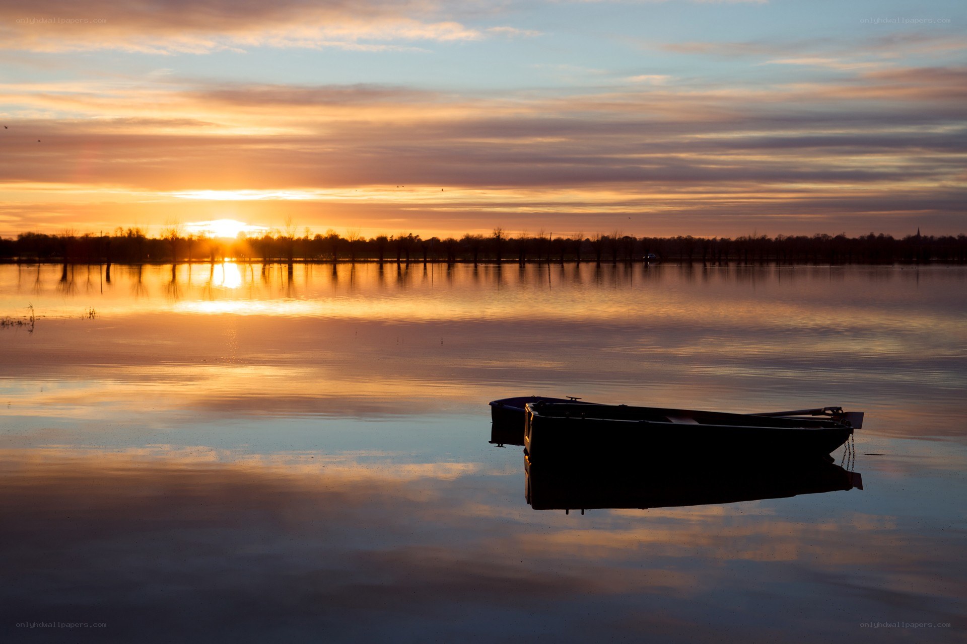 Sunset over a calm lake