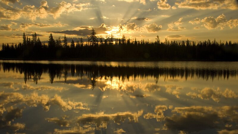 Sunset over a calm lake